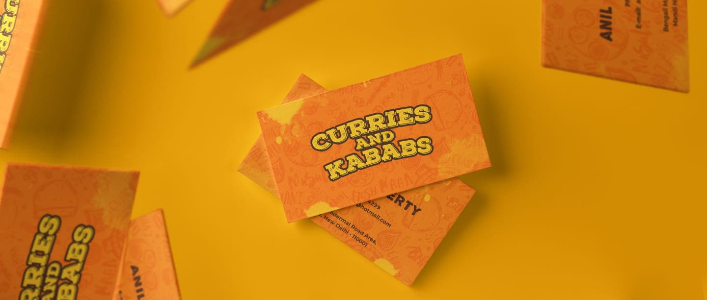 Business cards on orange textured background