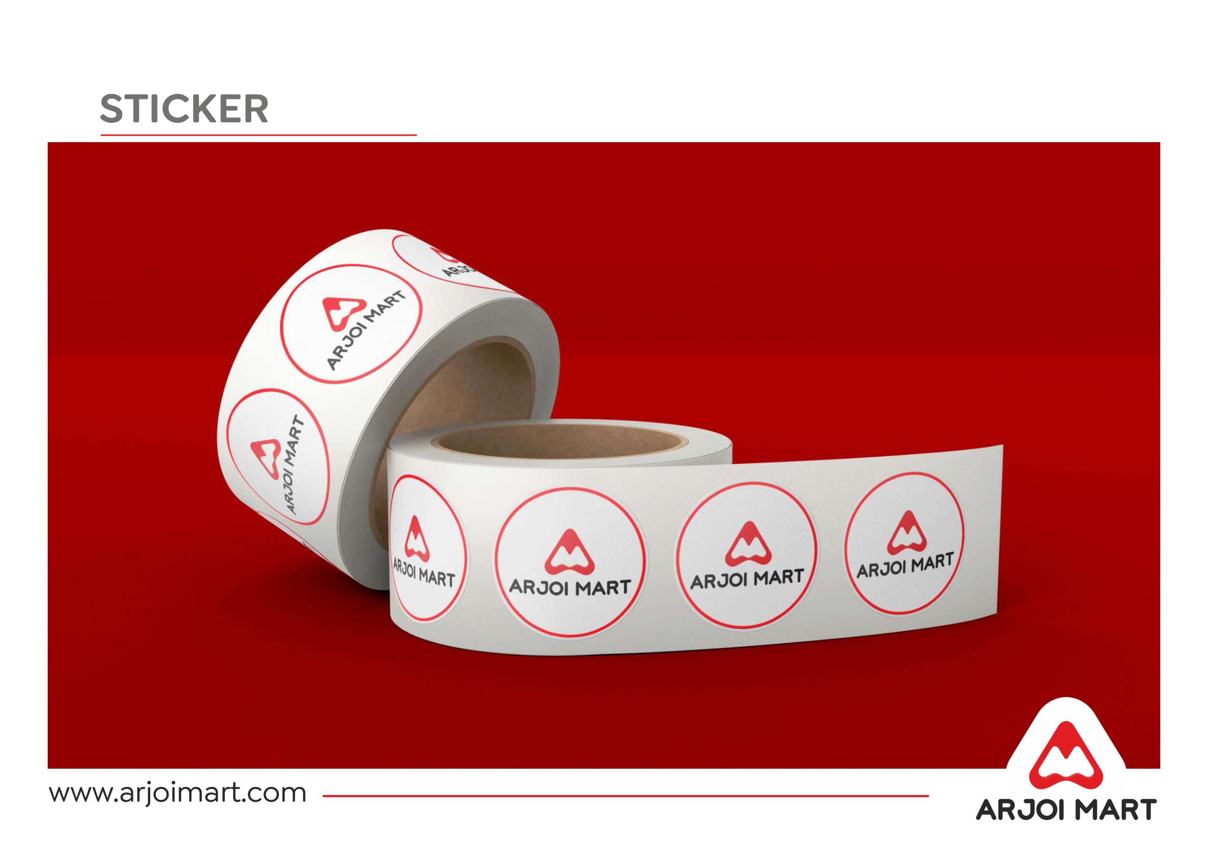 Branded sticker roll — circular Arjoi Mart logo stickers on red background